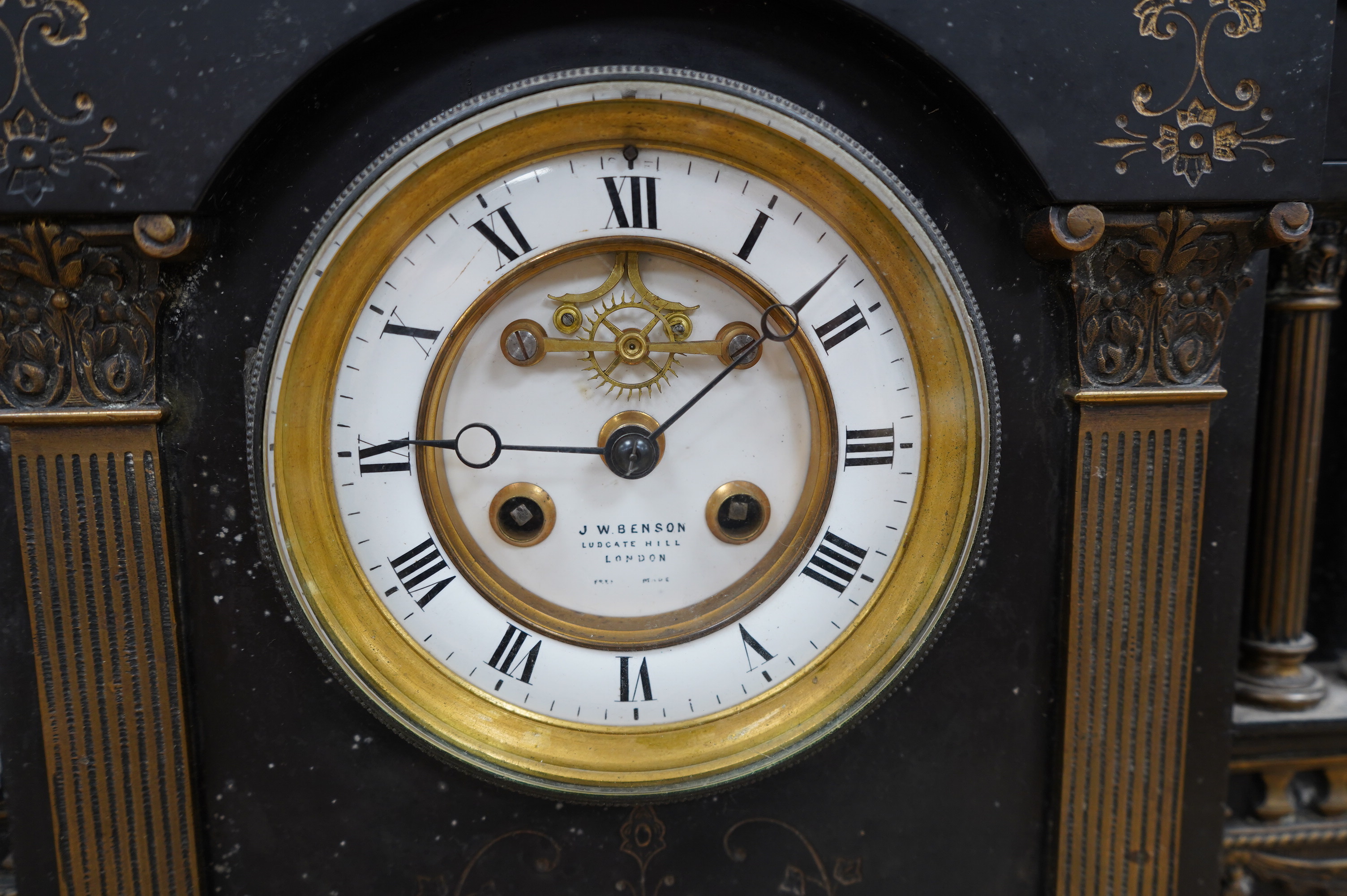 A large 19th century slate mantel clock, 42cm high. Condition - fair, not tested if working